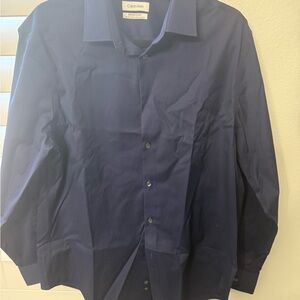 Brand new men’s Calvin Klein Navy Dress Shirt size large